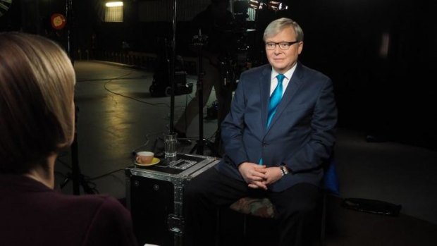 In the blue (tie) corner: Kevin Rudd listens to Sarah Ferguson. 