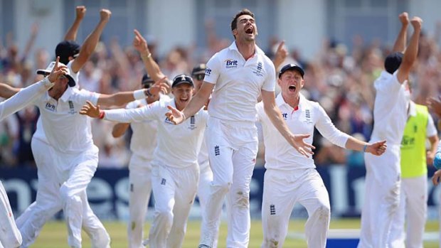 James Anderson of England celebrates the final wicket of Brad Haddin of Australia and victory with team mates during day five of the 1st Investec Ashes Test match between England and Australia at Trent Bridge Cricket Ground on July 14, 2013 in Nottingham, England.