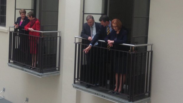 Lord Mayor Graham Quirk shows off the renovated City Hall to PM Julia Gillard.