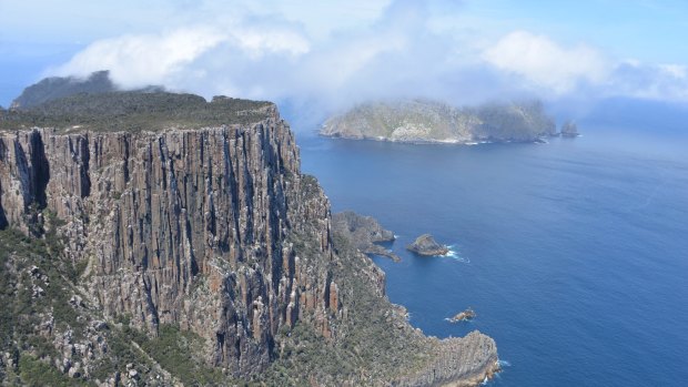 Cliff-top walking along Tasmania's Three Capes Track.
