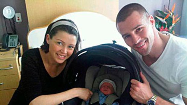 Twitter pic ... Dannii Minogue and Kris Smith with newborn baby Ethan.
