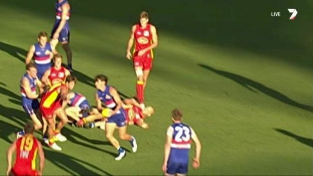 Gold Coast captain Gary Ablett could be scrutinised by the match review panel for this off-the-ball blow to Western Bulldogs' Liam Picken.