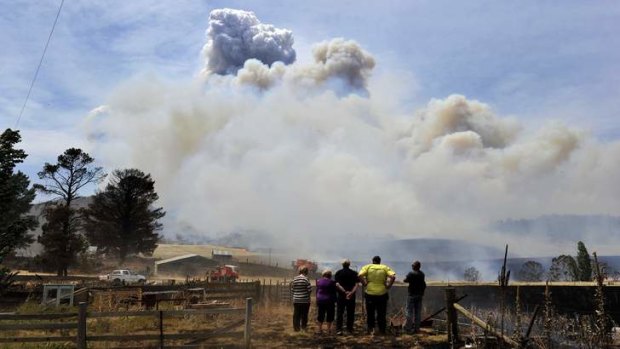 Residents and the RFS on sight at the major bushfire on Mount Forest Road near Cooma, on Tuesday January 8.