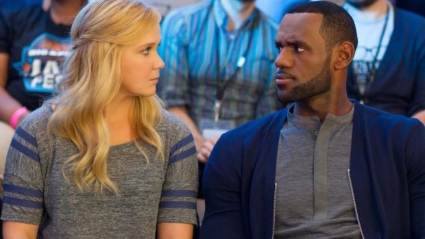 Amy Schumer and LeBron James, in a scene from <i>Trainwreck</i>.
