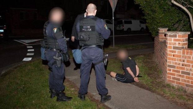 Police execute terror raids in Sydney last week. About six of of the men targeted had already had their passports confiscated. 