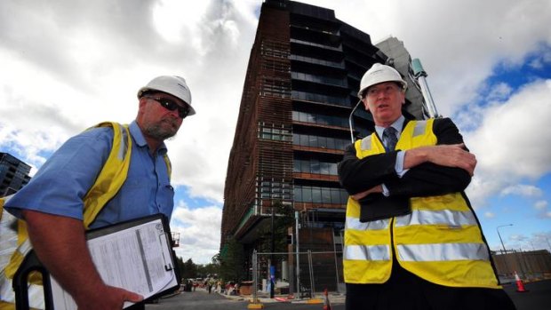 Workplace safety officers Alan Chipperfield and Mark McCabe are part of a team of officers that made a suprise visit to the Nishi building site in Canberra on Wednesday.