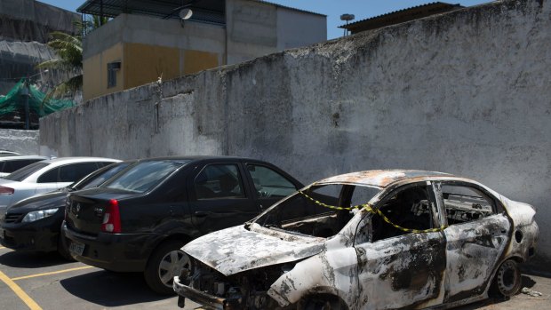 The burnt car Rio police say contained the body of Greece's ambassador to Brazil, Kyriakos Amiridis.