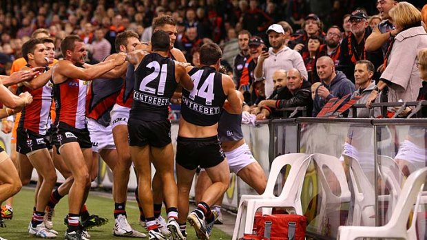 St Kilda and Essendon players were fined for wrestling.