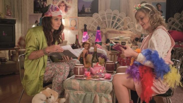 A teen movie for adults: Tina Fey (Kate Ellis) and Amy Poehler (Maura Ellis) in <i>Sisters</i>.