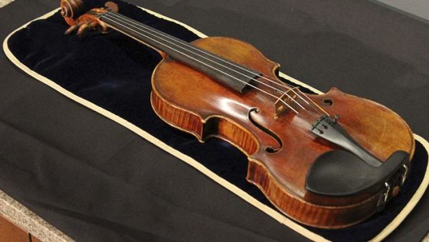 The 300-year-old stolen Stradivarius violin displayed by police after it was recovered in Milwaukee, Wisconsin.
