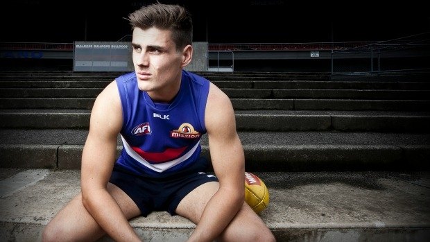MELBOURNE, AUSTRALIA - DECEMBER 01:  Western Bulldogs new recruit Tom Boyd poses for a photo displaying his jumper with the number 17 at Whitten Oval in Footscray on December 1, 2014 in Melbourne, Australia.  (Photo by Arsineh Houspian/Fairfax Media)