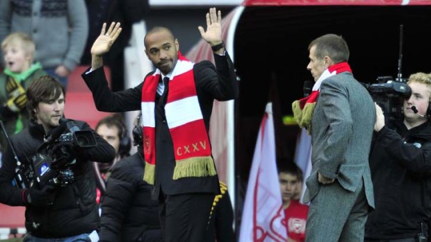 Darling of the pitch &#8230; Thierry Henry salutes his Arsenal fans.
