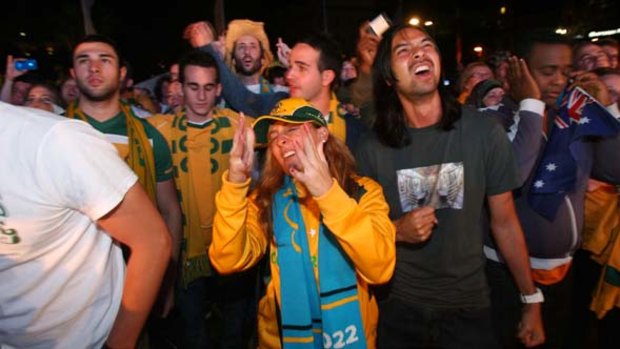 Heartbreak ... fans show their disappointment at the announcement that Qatar had won the right to host the 2022 World Cup
