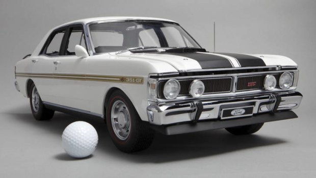 Muscular ... Icon Models' Ford Falcons in one-eighth scale (the golf ball is for size comparison) are worth $1295, or $2000-plus on the secondary market.