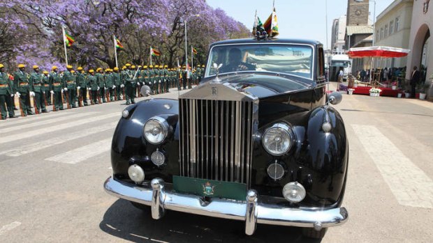 President Robert Mugabe's car waits outside the opening of  Parliament.