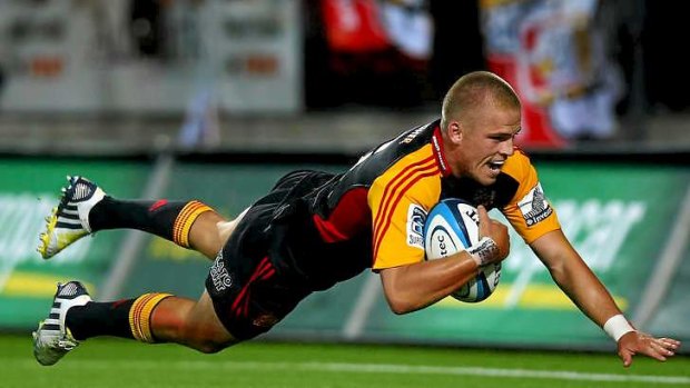 Flurry of tries ... Gareth Anscombe scores one of four late tries for Chiefs.