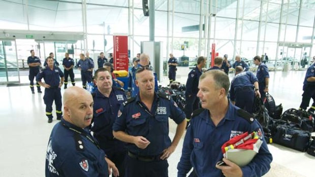 Assessors ... NSW hazardous materials specialists at the airport.