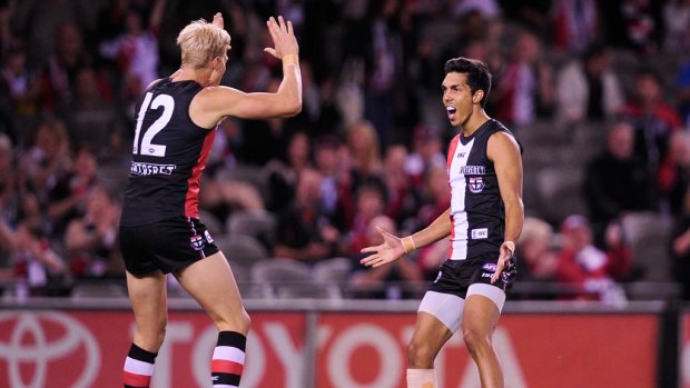 St Kilda's Terry Milera celebrates the opening goal with Nick Riewoldt.