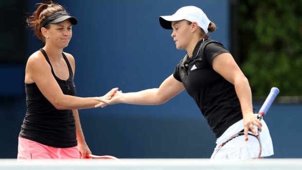 Ashleigh Barty and Casey Dellacqua celebrate match point during their women's doubles second round match against Petra Cetkovska of Czech Republic and Kirsten Flipkens at the US Open.