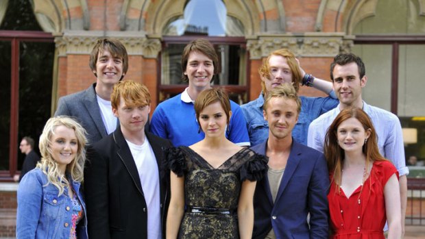 The cast of <I>Harry Potter and the Deathly Hallows: Part II</i> gathers for a publicity photo outside London's Kings Cross station.
