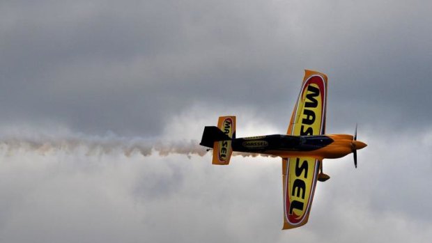Aerobatic pilot Matt Hall  put on two breath-taking aerobatic displays  at the Canberra Airport open day.