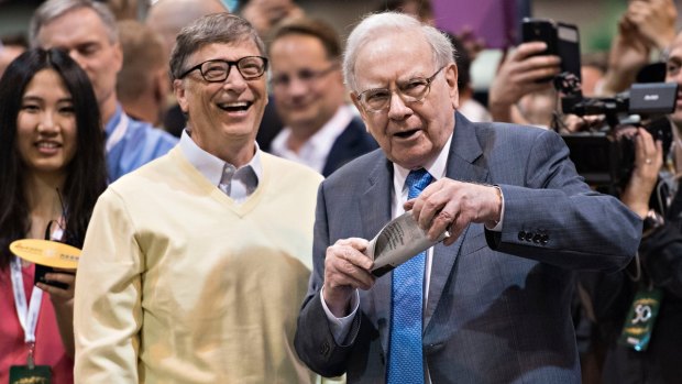 Uber-wealthy: Bill Gates is still the world's richest man, but Warren Buffett, right, has already been overtaken by Ortega.  