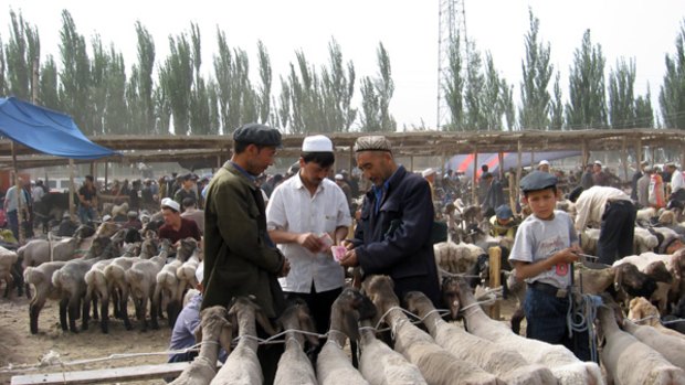 Market forces ... Kashgar vendors selling livestock.