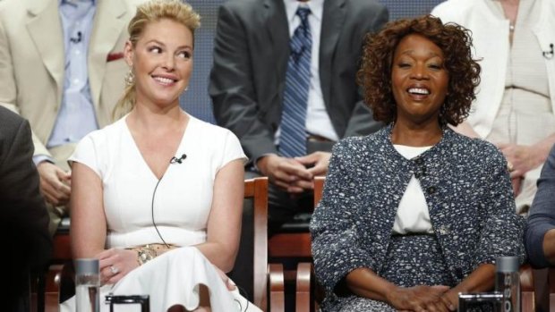 Raising a smile ... Katherine Heigl (left) and Alfre Woodard laugh during a panel for the television show <i>State of Affairs</i>.