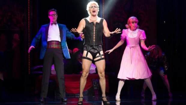 No stone unturned, no song ungrowled: Craig McLachlan as Frank N Furter with Stephen Mahy and Amy Lehpamer as Brad and Janet. 
