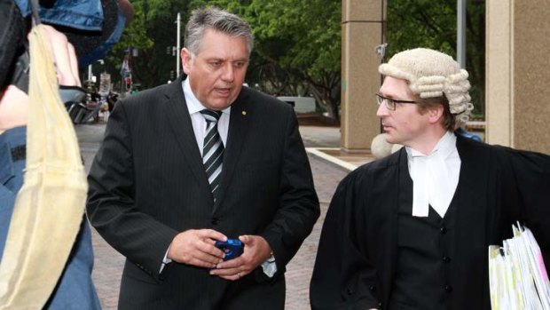 Defamation case: Ray Hadley leaves the NSW Supreme Court with counsel on Monday.