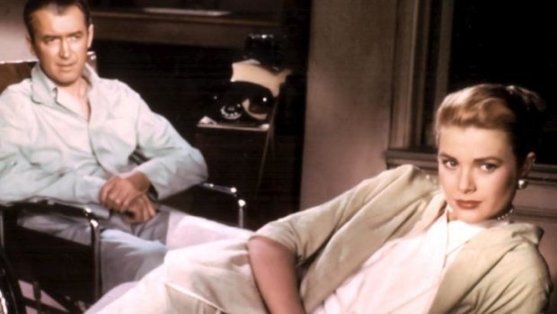 Glamorous suspense: James Stewart and Grace Kelly in <i>Rear Window</i>.
