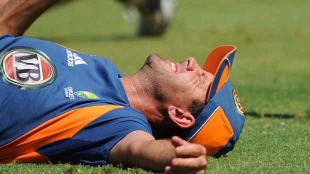 Getting rid of the cricks . . . Australian captain Ricky Ponting stretches during a training session in Ahmedabad yesterday.