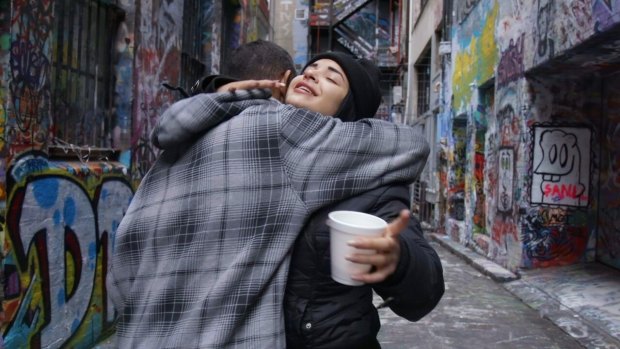 Kayla Fenech embraces John, a homeless man who educated her about sleeping rough in Melbourne.