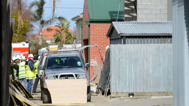 The scene of the building collapse in Caulfield, where one man has died and another has been left badly injured.