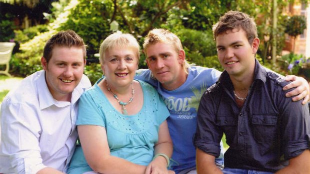 Mitchell Sweeney (right) with his brother Justin, mum Wendy and brother Brendan.