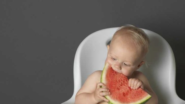 Introducing solids into a baby's life earlier could help prevent the child from developing allergies.