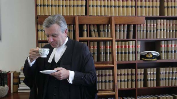 Justice Michael Slattery takes tea in his chambers.