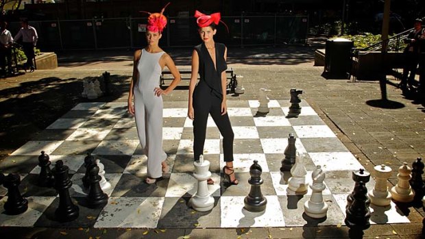Checkmate &#8230; jumpsuits by Bianca Spender, left, and Carla Zampatti, right. Head pieces by Gregory Ladner.