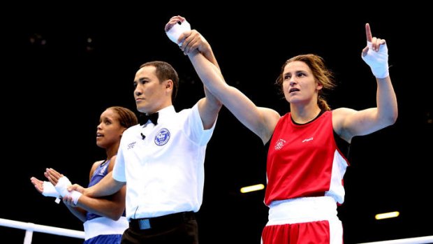 Fightin' Irish ... Katie Taylor defeated Britain's Natasha Jonas 26-15 to advance to the semi-final of the women's lightweight competition, where she meets Tajikistan's Mavzuna Chorieva.
