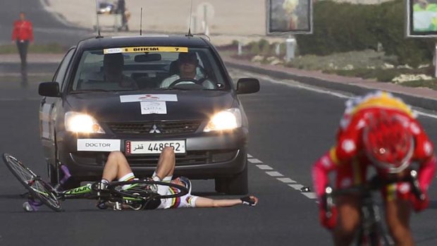 Giorgia Bronzini of Italy falls during the second stage of the Tour of Qatar women's cycling race in al-Shamal, north of the capital Doha.