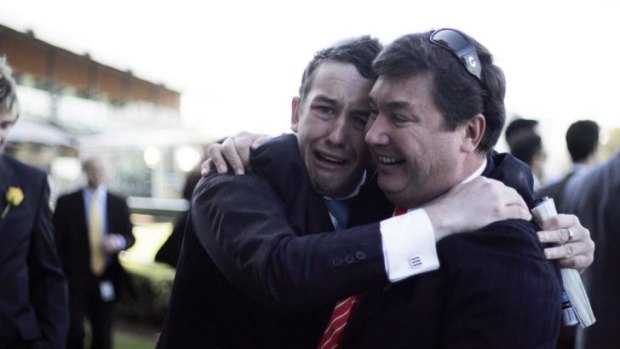 Appeal: Dean Watt (right, with son Adam at Rosehill in 2010) will appeal for fine over internet domain names.