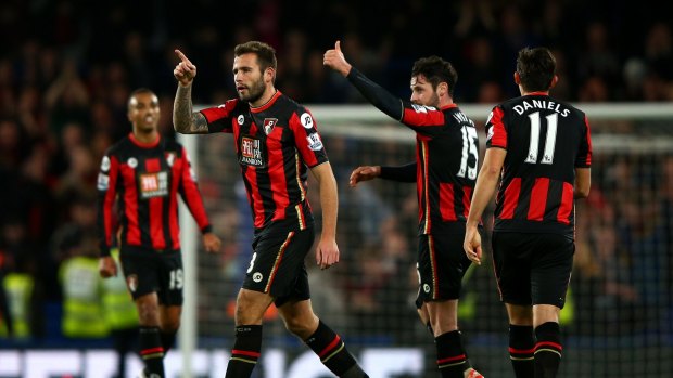 Victory: Bournemouth players celebrate their 1-0 win in the Premier League match between Chelsea and Bournemouth at Stamford Bridge.