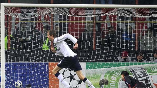 Spurs strike . . . Peter Crouch of Tottenham starts celebrating after scoring past AC Milan goalkeeper Marco Amelia.