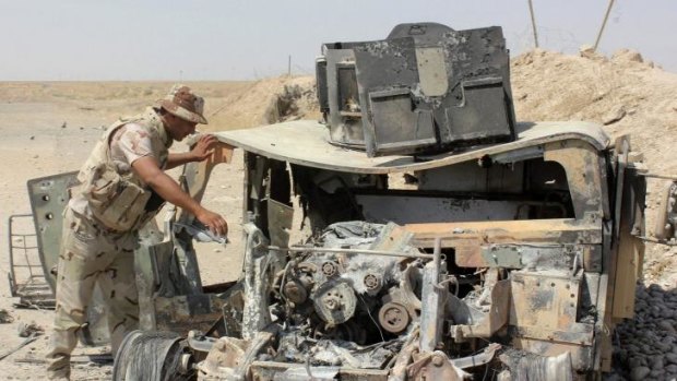 The wreckage of a Humvee used by the Islamic State militants. 