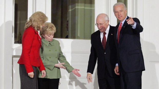 US Vice-President Dick Cheney (second right) and his wife Lynne (second left) greet vice-president-elect Joe Biden and his wife Jill at the US Naval Observatory in Washington.