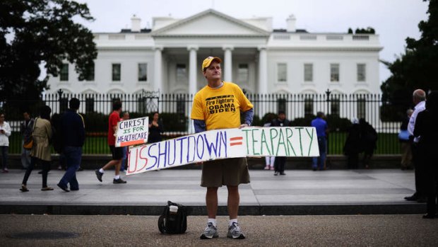 Lone stand: A supporter of US President Barack Obama displays a placard in front of the White House.