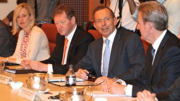 ACT Chief Minister Katy Gallagher, Dr Ian Watt, Secretary of Prime Minister and Cabinet, Prime Minister Tony Abbott and then NSW Premier Barry O'Farrell, during a COAG meeting.