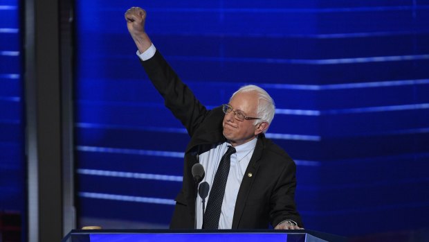 Senator Bernie Sanders gestures on stage during the Democratic National Convention.