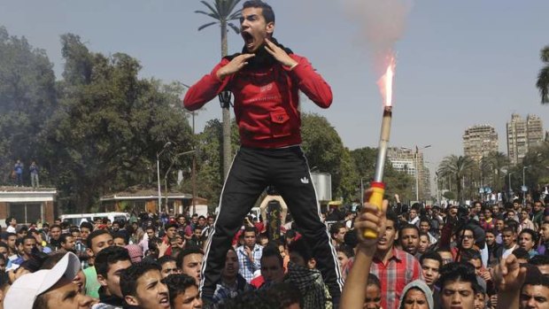 Muslim Brotherhood students and supporters of ousted president Mohamed Mursi pictured during clashes with riot police at Cairo University.