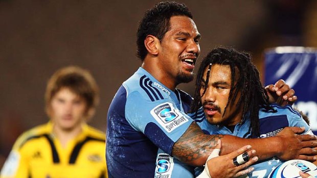 Ma'a Nonu of the Blues celebrates with Bradley Mika after scoring a try.